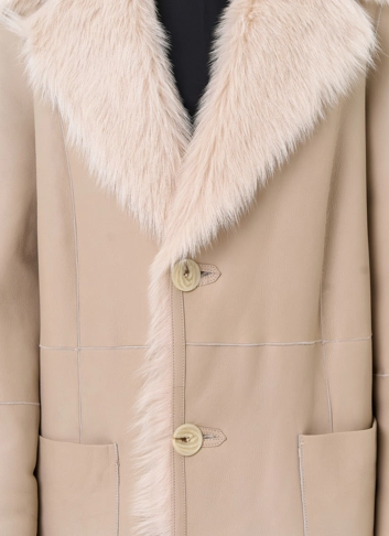 Женская двухсторонняя дубленка с поясом фото